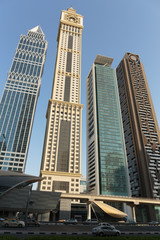 Obraz premium DUBAI, UAE - NOVEMBER 9, 2013: Modern buildings. Dubai was the f