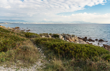 Fototapeta na wymiar Rocky coast of the Cote d'Azur, France
