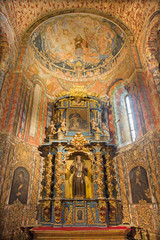 Fototapeta na wymiar AVILA, SPAIN, APRIL - 19, 2016: The baroque side altar os St. Benedict of Nursia in church Basilica de San Vicente and chapel in style 