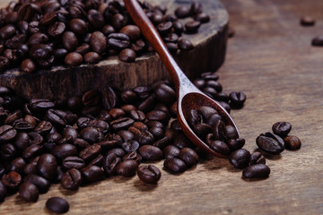 Coffee Bean on wood background with filter effect retro vintage