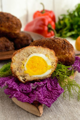 Meat mini-rolls (cutlet) with boiled egg. Close up