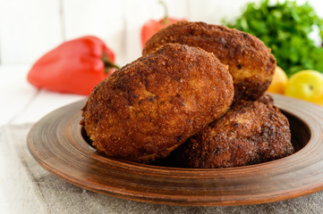 Meat mini-rolls (cutlet) with boiled egg. Close up