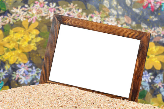 wooden picture frame  on the beach