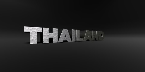THAILAND - hammered metal finish text on black studio - 3D rendered royalty free stock photo. This image can be used for an online website banner ad or a print postcard.