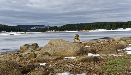 Yellow stones on river shore