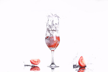 tomateos spashing into wine glass