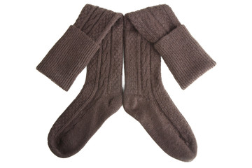 
Brown knitted socks isolated on white background