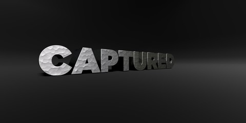 CAPTURED - hammered metal finish text on black studio - 3D rendered royalty free stock photo. This image can be used for an online website banner ad or a print postcard.