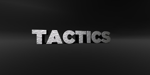 TACTICS - hammered metal finish text on black studio - 3D rendered royalty free stock photo. This image can be used for an online website banner ad or a print postcard.