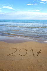 Drawing 2017 on the sand