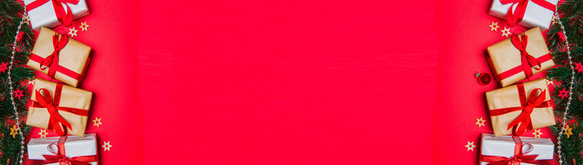 Christmas red background banner with tree, gift and decoration