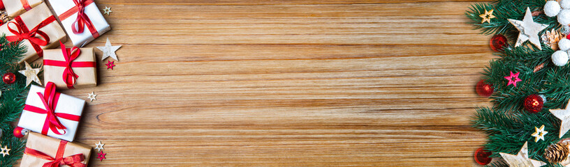 Christmas wooden background banner with tree, gift and decoratio