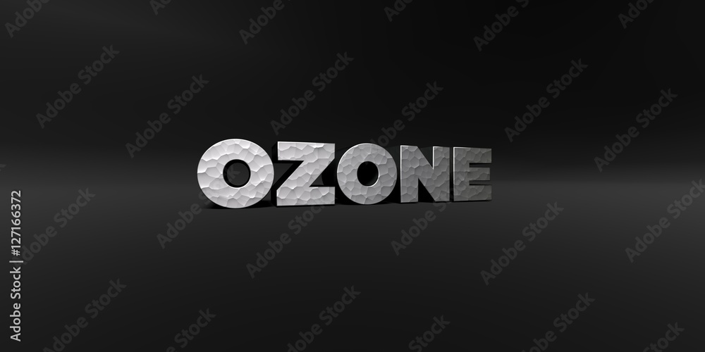 Fototapete ozone - hammered metal finish text on black studio - 3d rendered royalty free stock photo. this imag