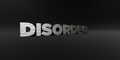 DISORDER - hammered metal finish text on black studio - 3D rendered royalty free stock photo. This image can be used for an online website banner ad or a print postcard.