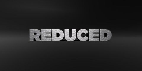 REDUCED - hammered metal finish text on black studio - 3D rendered royalty free stock photo. This image can be used for an online website banner ad or a print postcard.