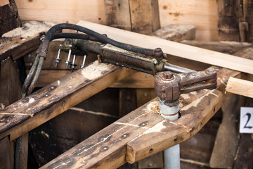 repair old wooden fishing boat. Large ocean boat. Traditional Scandinavian wooden ships. ship repair workshop. steering gear the boat