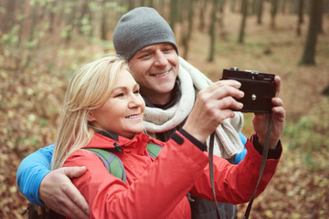 Happy couple taking picture of themselves.