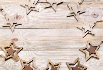 Fototapeta na wymiar Christmas decoration over wooden background. Winter holidays concept. Space for text 