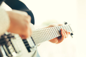 man playing electric guitar © fotofabrika