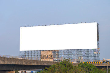 Obraz premium large blank billboard on road with city view background