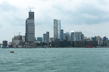Fototapeta premium Hong Kong skyline in the rainy season with smog cloud