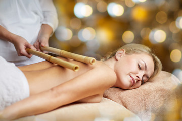 close up of woman lying and having massage in spa