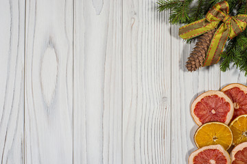 Christmas composition.Spruce branches with dried grapefruit and