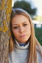 Pretty blonde girl in the park