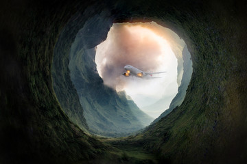 Dreams travel of airplane was flying through entrance to the cave in the green mountain., This...