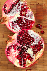 Pieces of ripe juicy pomegranate and seeds