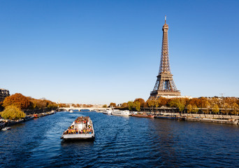 Boat Cruise on the Seine River with the Eiffel Tower in Paris, France during Autumn  - obrazy, fototapety, plakaty