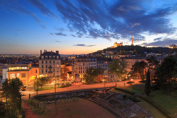 Naklejka premium Amphitheatre des Troi Gaules, Croix Rousse and Vieux Lyon with Fourviere Basilica in the evening. Lyon, France