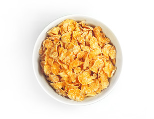cornflakes in a white bowl, isolated on white background. High angle view.