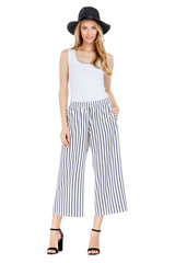 Fashion photo of young magnificent woman wearing fashionable summer clothes