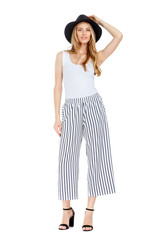 Fashion photo of young magnificent woman wearing fashionable summer clothes