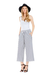 Fashion photo of young magnificent woman wearing fashionable summer clothes