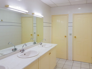 Interior design of a clean public toilet.
