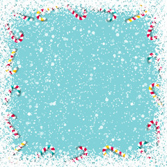 Snowy Christmas Background with candy canes frame