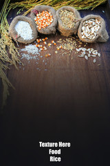Asian food top view rice corn plant seed burlap sack with rice grain style on top wood,