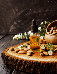 jar of oil almond, black stone, for spa, selective focus