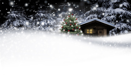 Schihütte mit Weihnachtsbaum bei Nacht