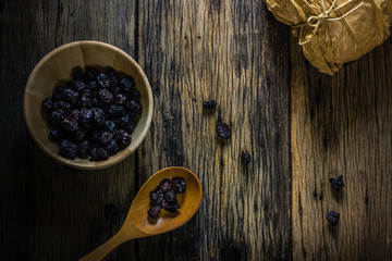 Chinese jujube dry on old wooden table. Chinese jujube dry eat or to cook very well in Asia.