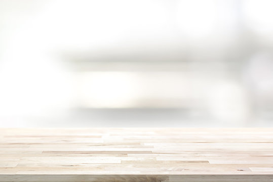 Wood table top on blur kitchen shelf background
