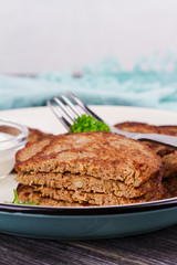 Liver Patties with Sour Cream and Parsley. Liver Cakes or Fritters of Liver. Healthy snack or take-away lunch bites