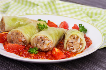 Cabbage rolls with meat, rice and vegetables in tomato sauce. Stuffed cabbage leaves with meat. Dolma, sarma, sarmale, golubtsy or golabki - traditional and popular dish in many countries