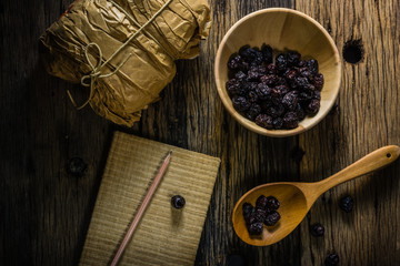 Chinese jujube dry on old wooden table. Chinese jujube dry eat or to cook very well in Asia.