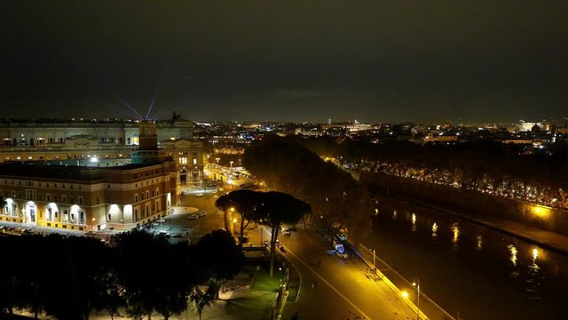 Amazing aerial view over the City of Rome by night from the top of Castel Sant Angelo