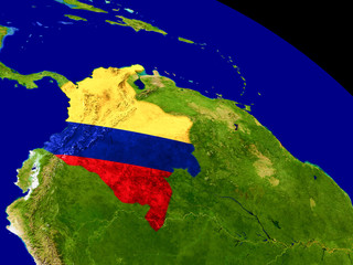Colombia with flag on Earth