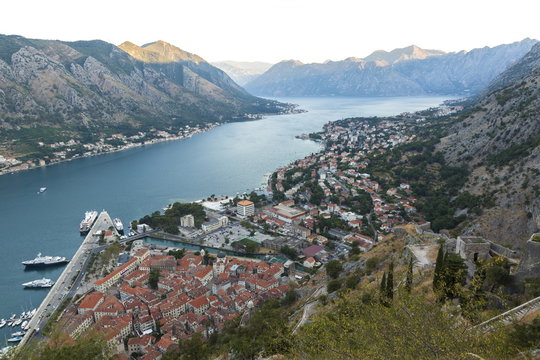 Kotor Old Town, marina and fortifications at dawn with view of the Bay of Kotor, Montenegro 