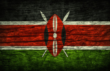 The national vintage flag of Kenya on wooden surface